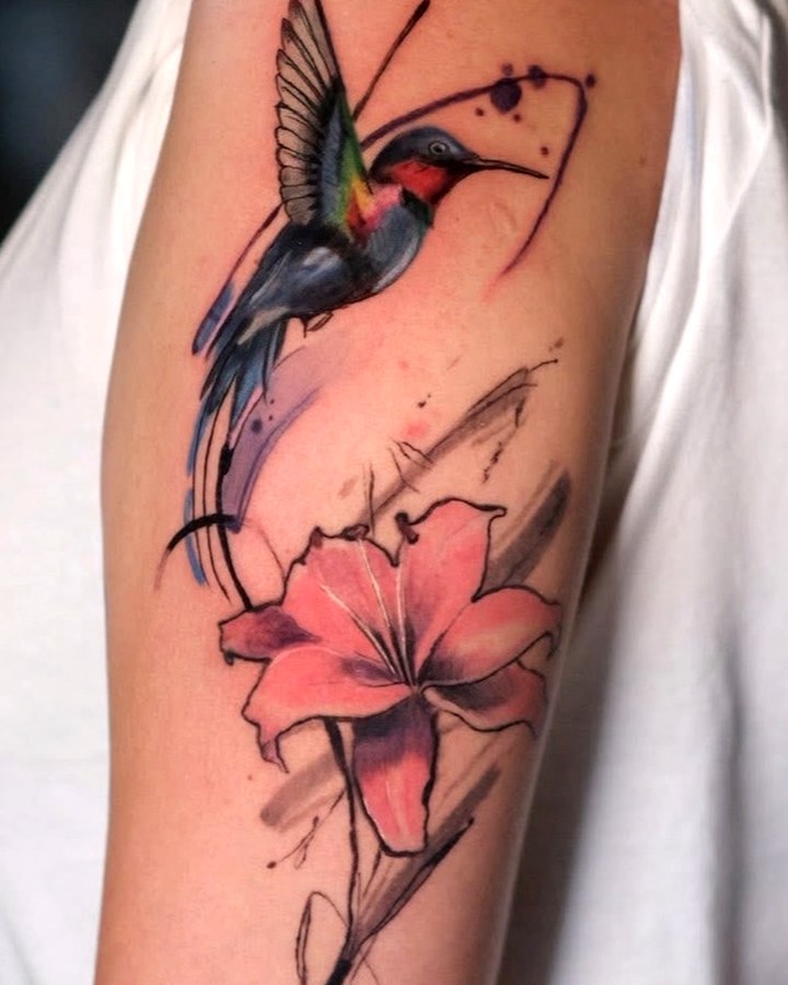 Color hummingbird and flower tattoo