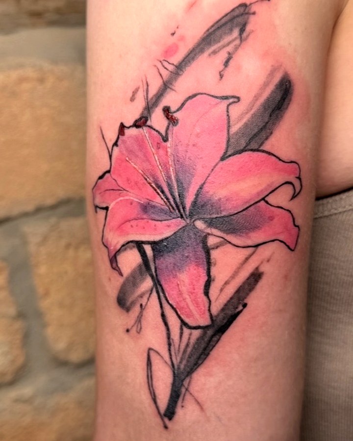 Pink lily tattoo